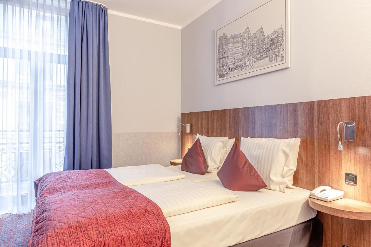 Отель Ramada By Wyndham Frankfurt Central Station Франкфурт-на-Майне Экстерьер фото